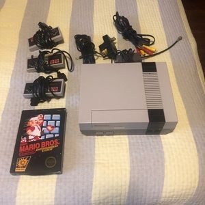 nintendo entertainment system (nes) with super mario bros